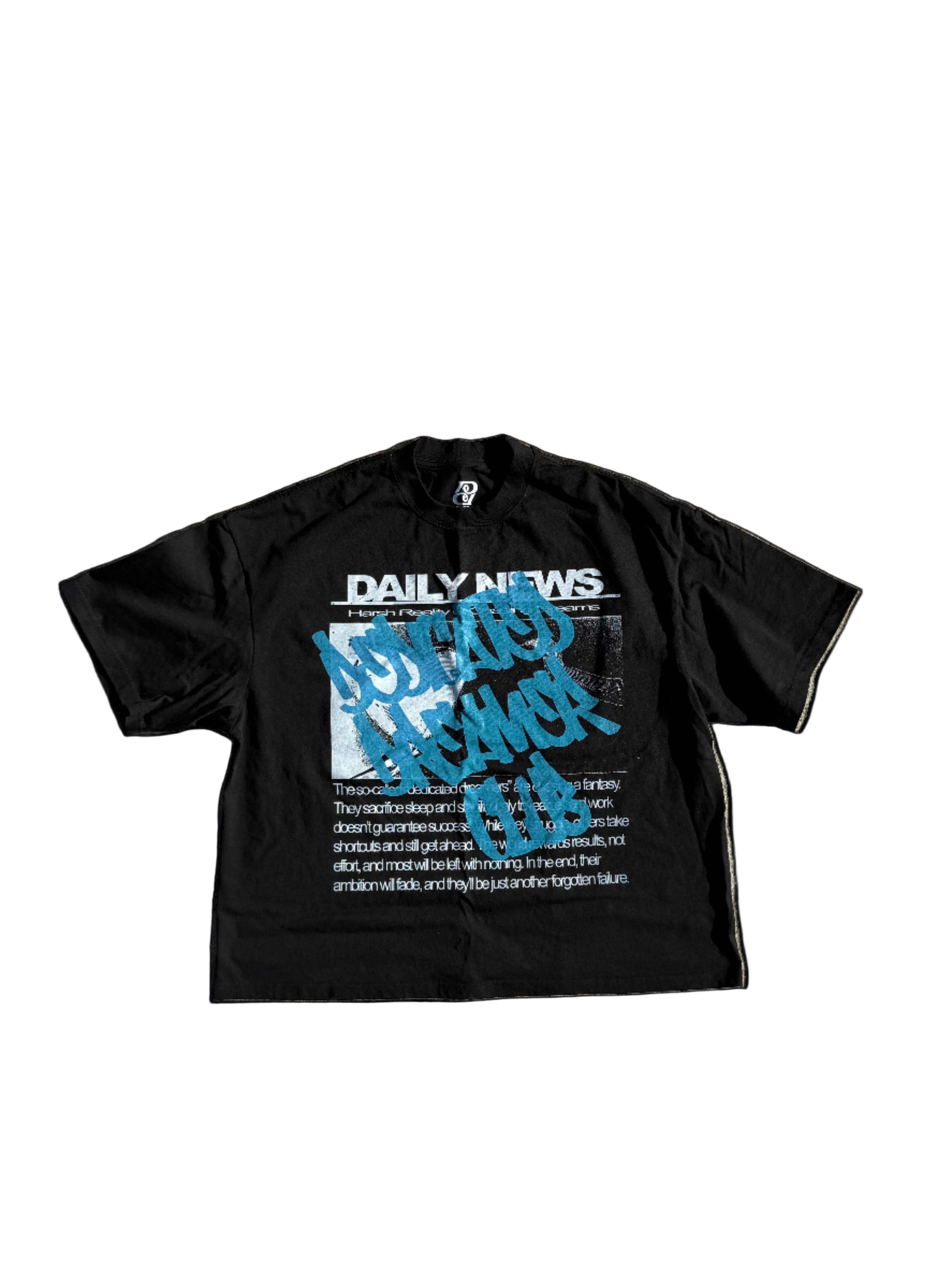 Black t-shirt with blue and white text on a textured surface